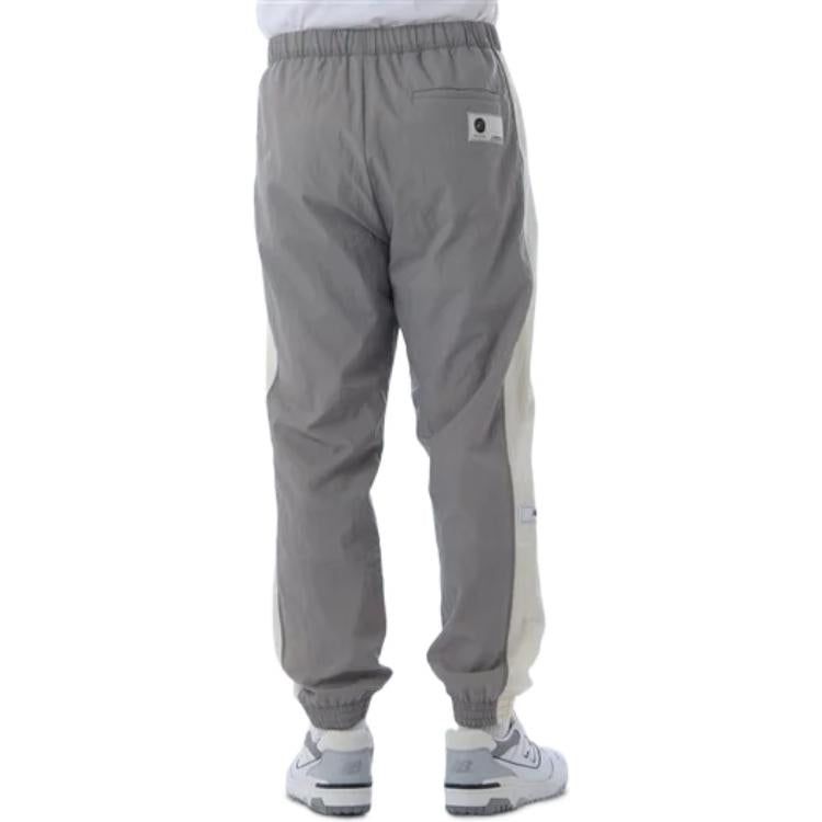 New Balance Basketball Wear Wind Pants Footwear Inspired 'Grey' AMP25122-GR sold by KicksCrew product image thumbnail 4