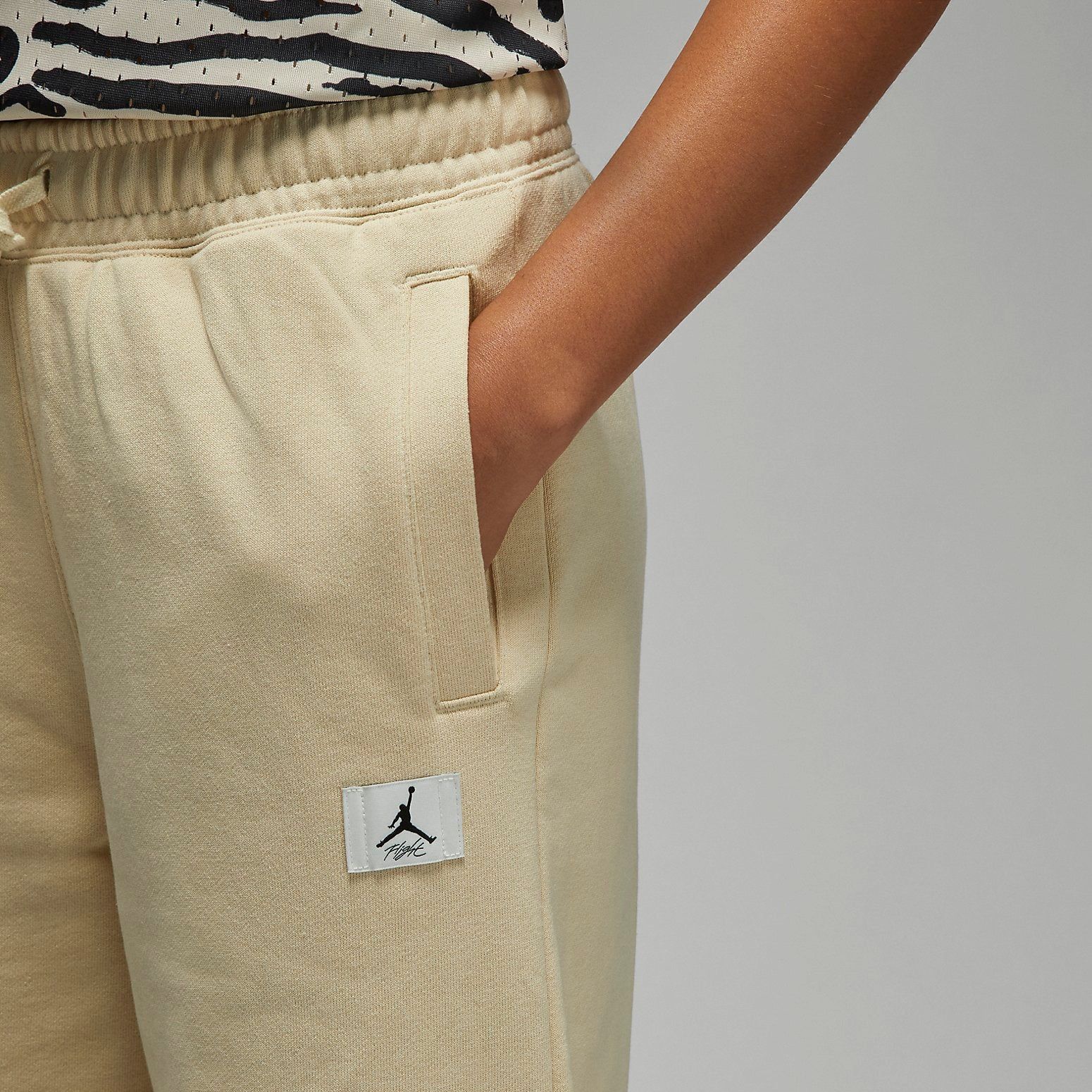 (WMNS) Air Jordan Flight Fleece Trousers 'Beach' DQ4607-234 sold by KicksCrew product image thumbnail 3