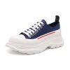 (WMNS) Alexander McQueen Tread Slick Sneakers 'Navy White Red' 702042WHZ624687 sold by KicksCrew