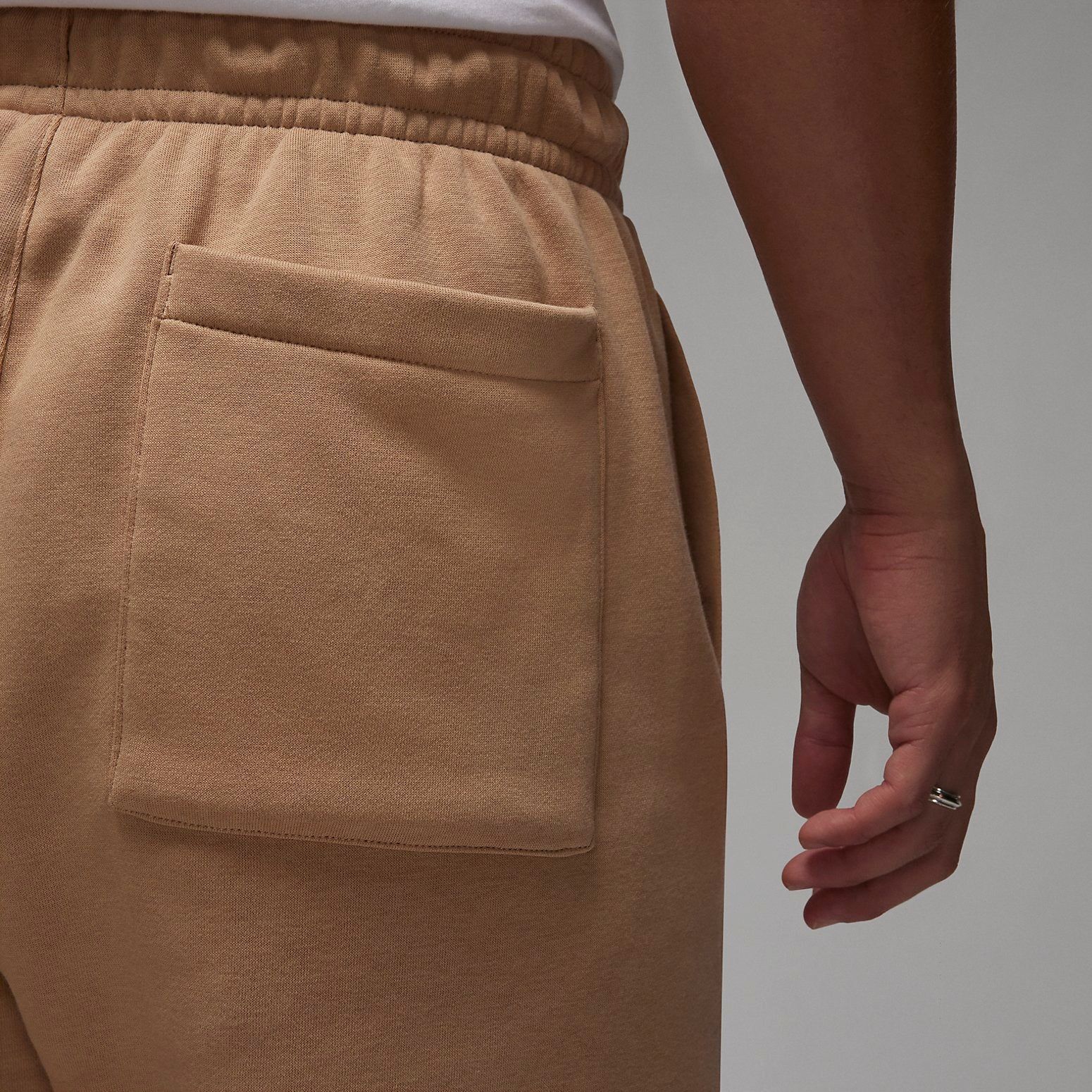 Air Jordan Essentials Fleece Baseline Pants 'Brown' FD7346-200 sold by KicksCrew product image thumbnail 4