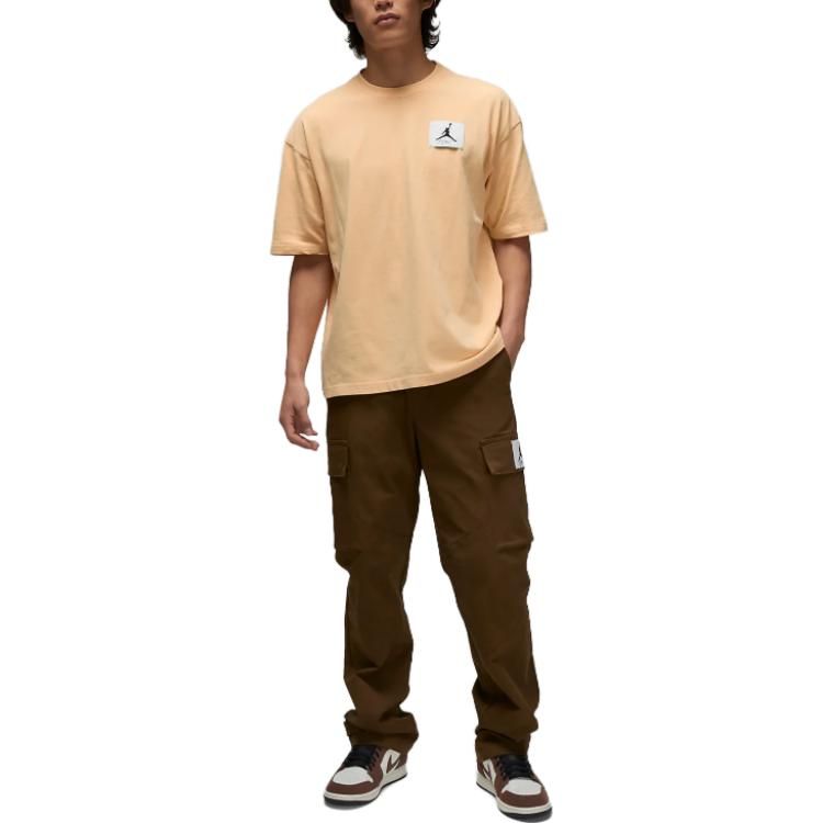 Air Jordan Flight Essentials Oversize T-shirt Asia Sizing 'Gold' DZ0605-251 sold by KicksCrew product image thumbnail 3