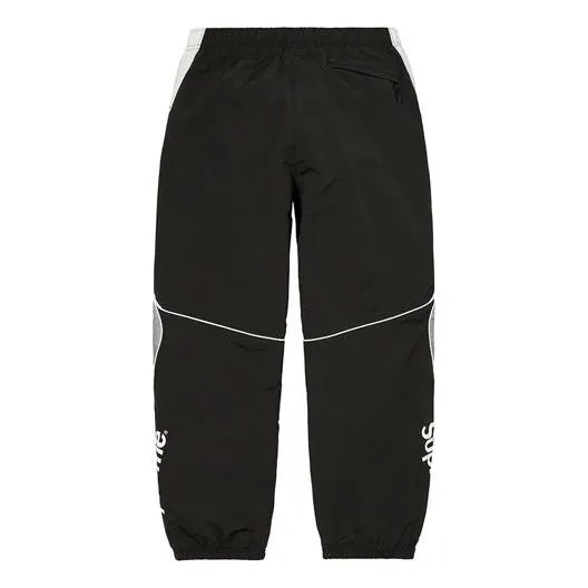 Supreme x Umbro Track Pants 'Black White' SUP-SS22-710 sold by KicksCrew product image thumbnail 2