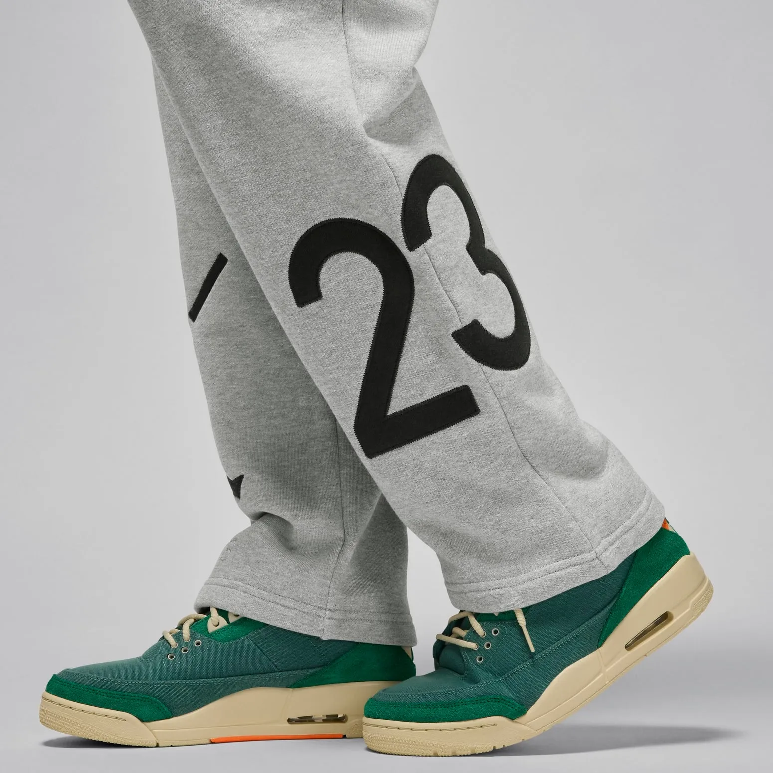 Air Jordan x Nina Chanel Abney Fleece Pants 'Grey Black' FZ7518-063 sold by KicksCrew product image thumbnail 5