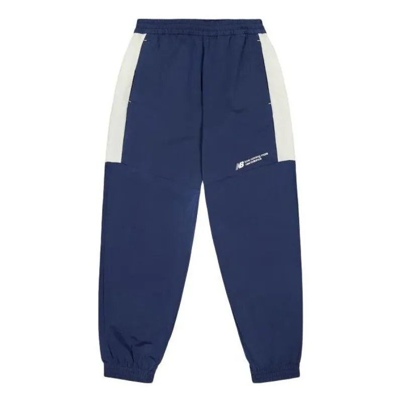 New Balance Woven Track Pants 'Navy' NTE24031-NV sold by KicksCrew