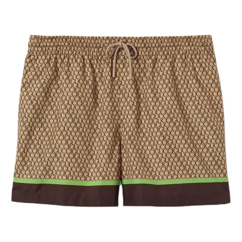 Gucci Allover Gucci Print Nylon Swim Shorts 'Beige Ebony' 791101-XHAJO-2270 sold by KicksCrew