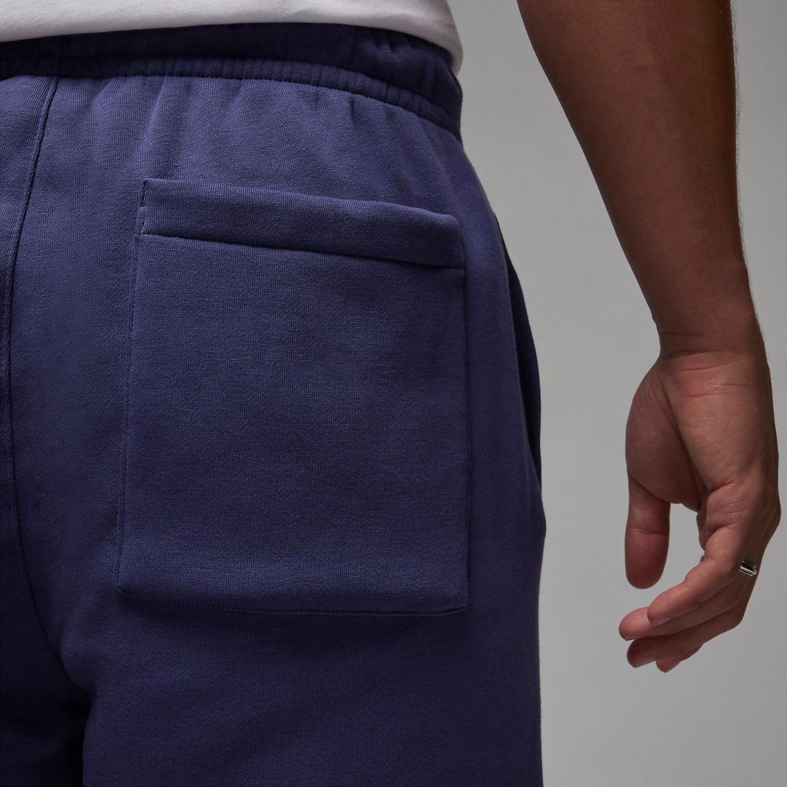 Air Jordan Essentials Fleece Pant 'Purple' FD7346-502 sold by KicksCrew product image thumbnail 4