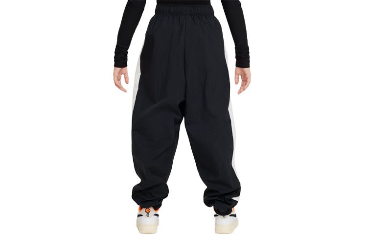 (GS) Nike Sportswear Woven Jogger Pants 'Black' FB1269-010 sold by KicksCrew product image thumbnail 2