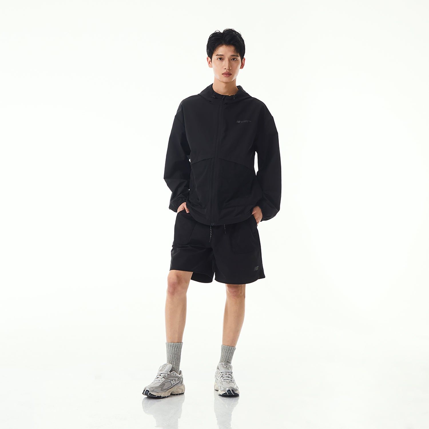 New Balance Woven Hooded Jacket 'Black' NAE24151-BK sold by KicksCrew product image thumbnail 5
