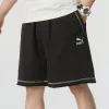 PUMA Logo Shorts 'Black with White Stitching' 626861-01 sold by KicksCrew
