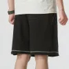 PUMA Logo Shorts 'Black with White Stitching' 626861-01 sold by KicksCrew