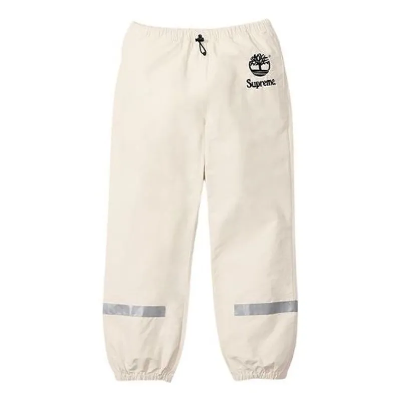 Supreme x Timberland Reflective Taping Track Pants 'White Black' SUP-SS21-712 sold by KicksCrew