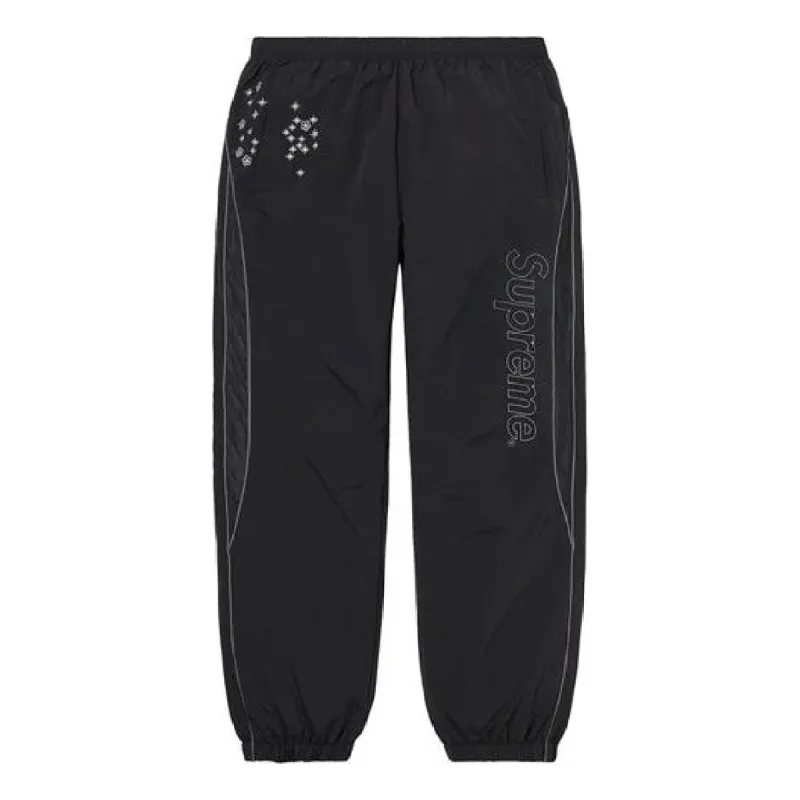 Supreme AOI Glow-In-the-Dark Track Pants 'Black White' SUP-SS22-120 sold by KicksCrew