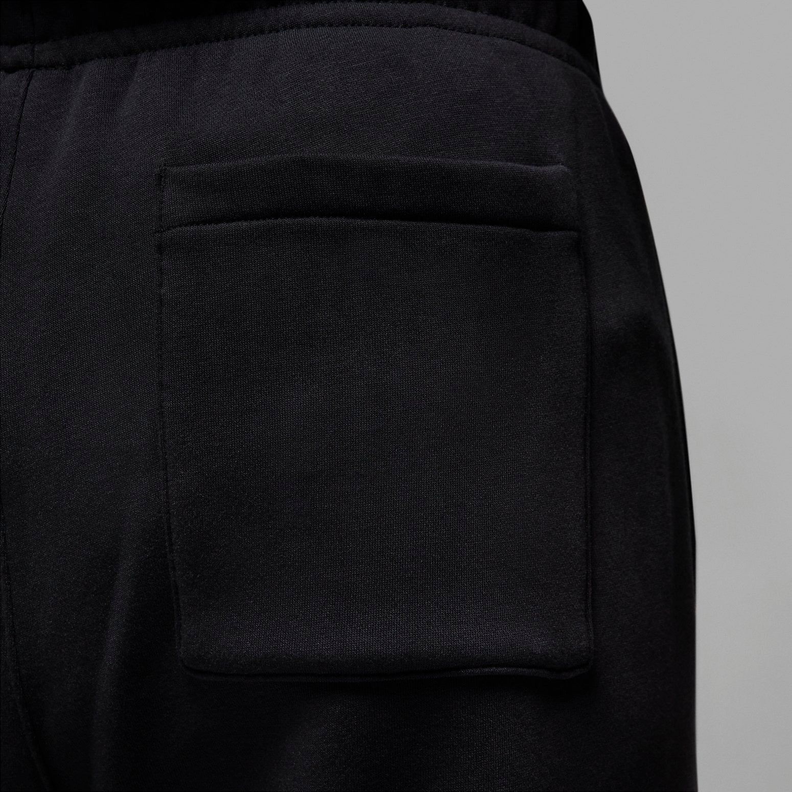 Air Jordan Essentials Fleece Baseline Pants 'Black' FD7345-010 sold by KicksCrew product image thumbnail 4