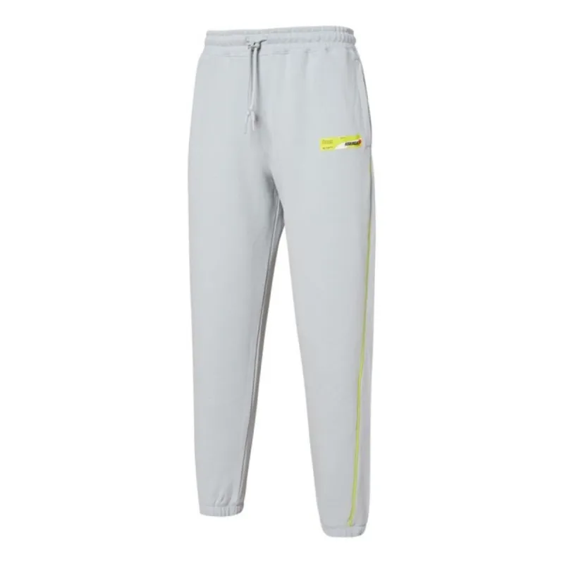 Puma x Roaringwild Sweatpants 'Grey Yellow' 532595-71 sold by KicksCrew