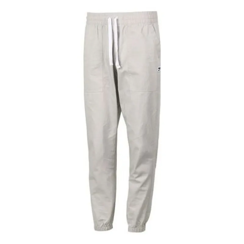 Puma Downtown Small Logo Pants 'Grey Black' 531434-09 sold by KicksCrew