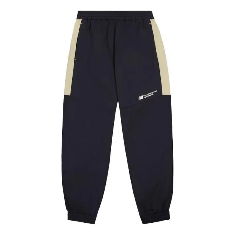 New Balance Woven Track Pants 'Black' NTE24031-BK sold by KicksCrew