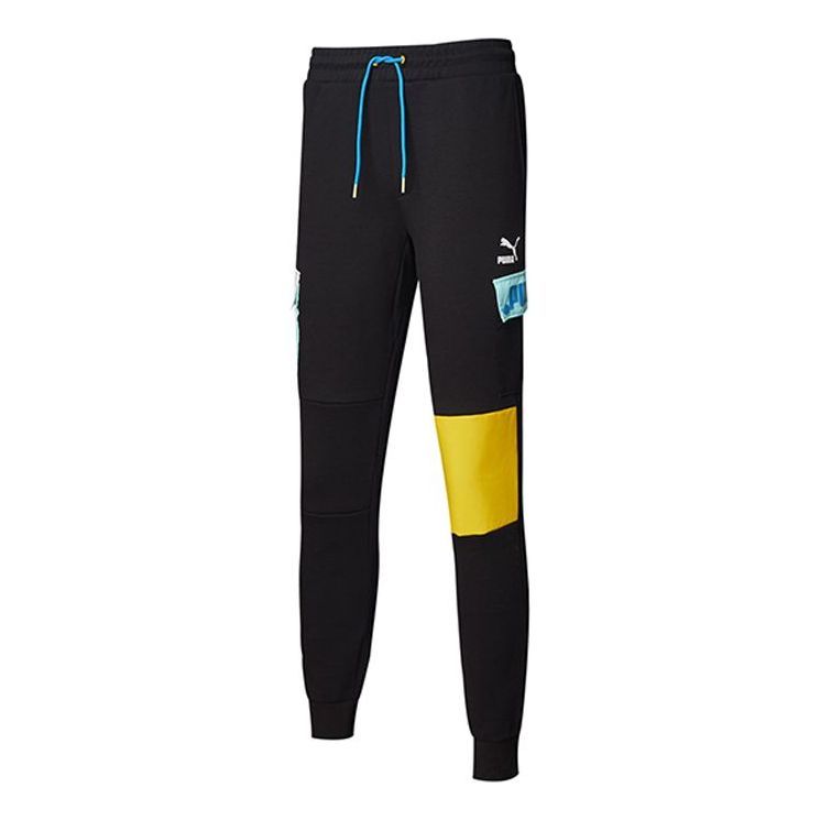 Puma Patched Track Pants 'Black Yellow White' 532182-01 sold by KicksCrew