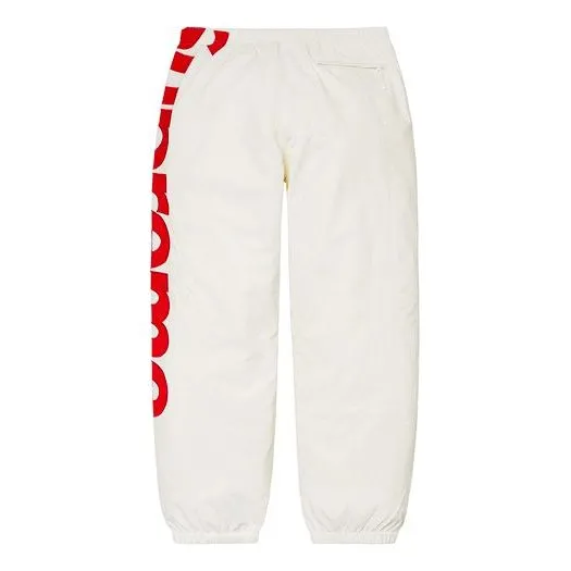 Supreme Spellout Track Pants 'White Red' SUP-SS21-449 sold by KicksCrew product image thumbnail 2