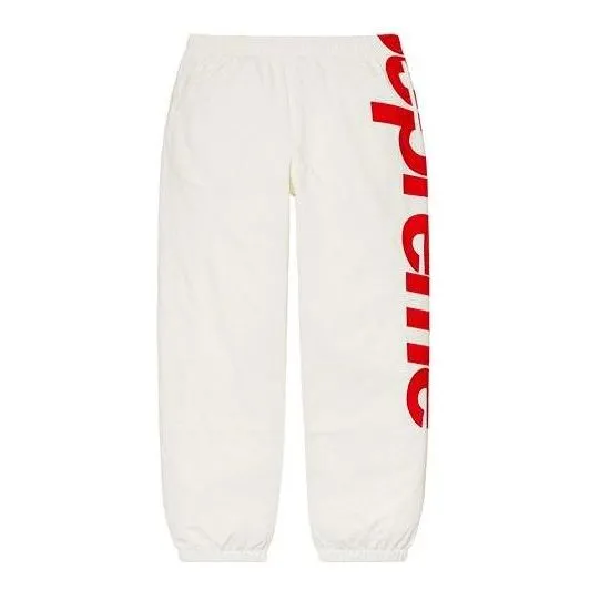 Supreme Spellout Track Pants 'White Red' SUP-SS21-449 sold by KicksCrew