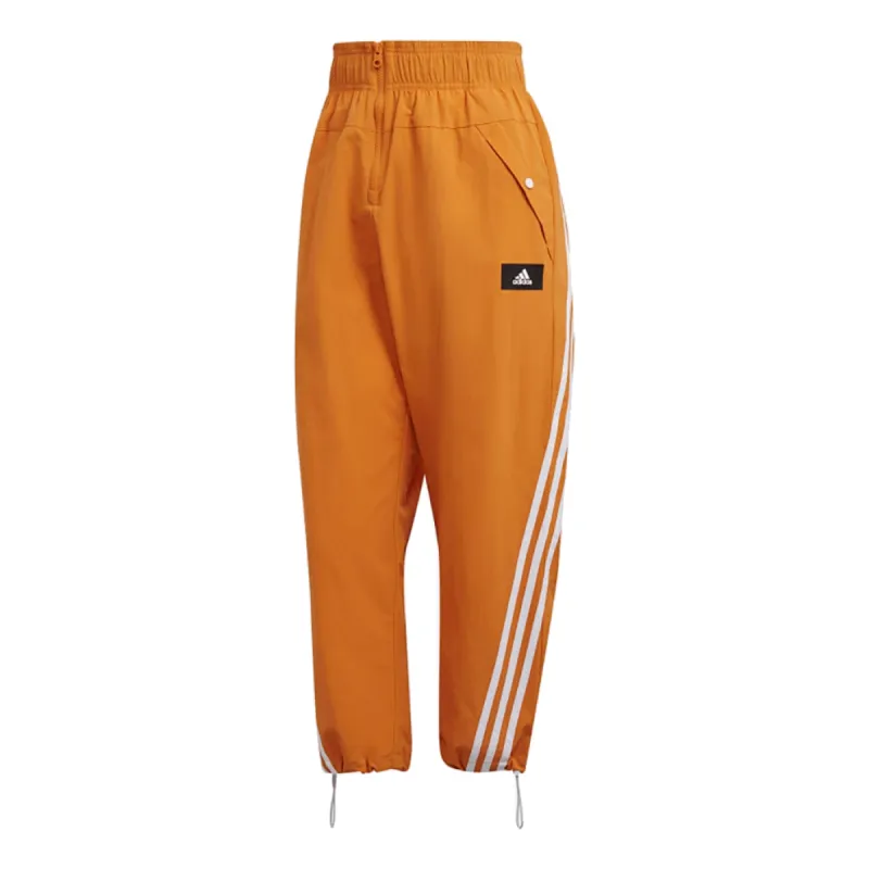 (WMNS) adidas Sportswear Future Icons 3-Stripes Woven Pants 'Orange' HA0815 sold by KicksCrew