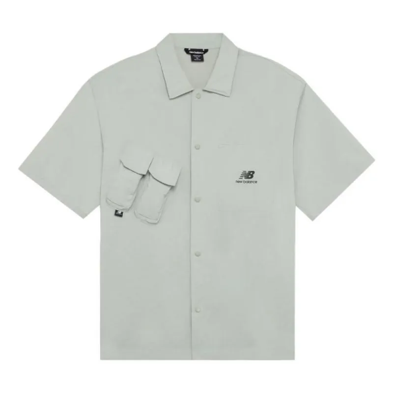 New Balance Classic Trend Short Sleeve Shirt 'Grey' AMJ22360 sold by KicksCrew
