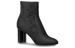 (WMNS) LOUIS VUITTON Silhouette 8cm Heeled Boots 'Black Monogram' 1ABP9G sold by KicksCrew