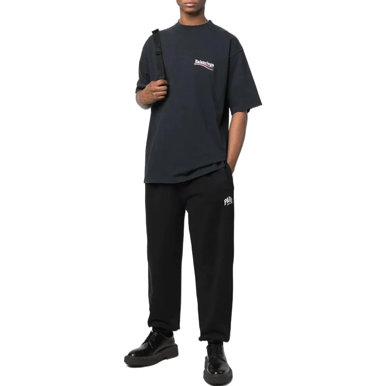 Balenciaga Paris Logo Stretched Knee Sweatpants 'Black White' 675244TLVL81070 sold by KicksCrew product image thumbnail 3