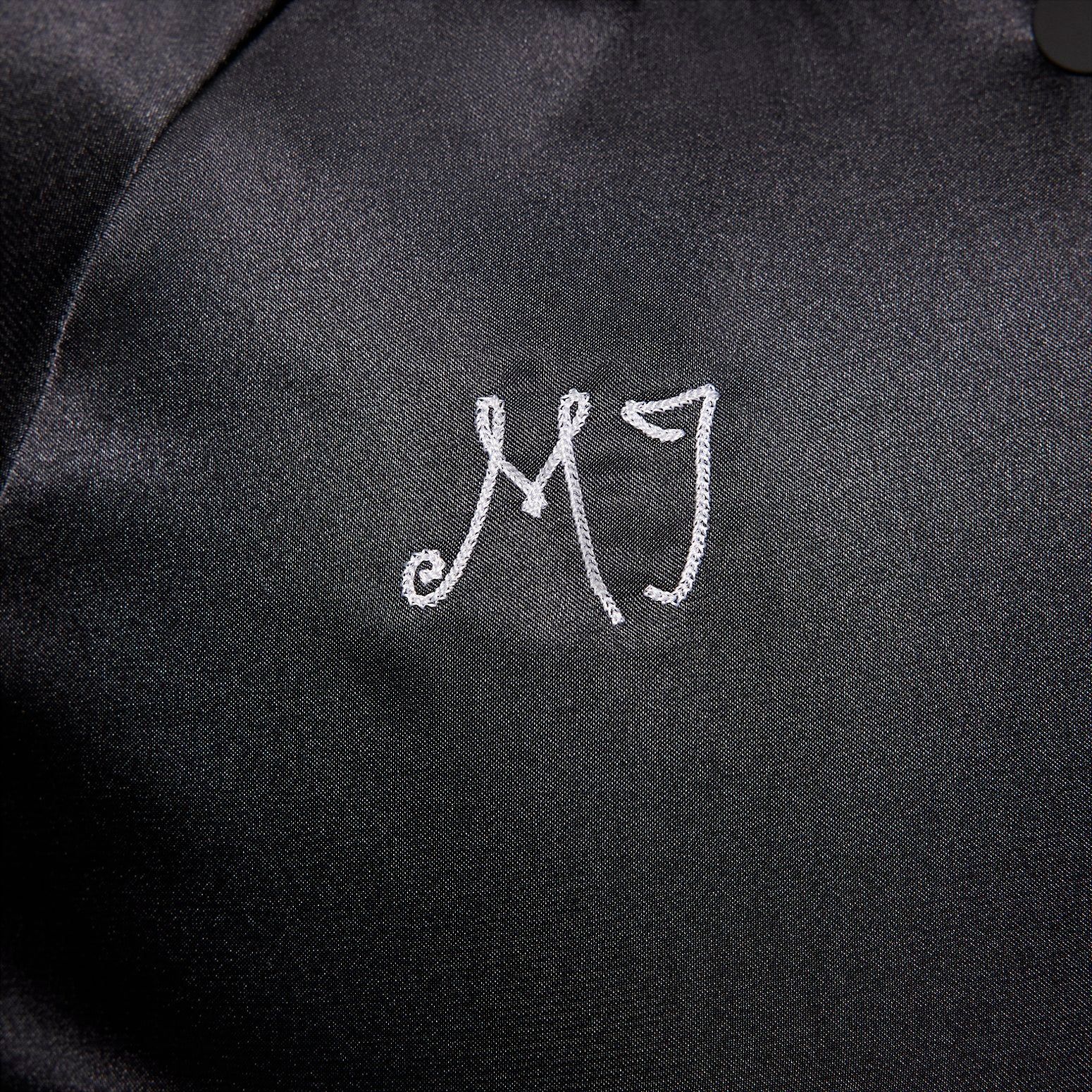 (WMNS) Air Jordan Varsity Jacket 'Black' FB5154-010 sold by KicksCrew product image thumbnail 3