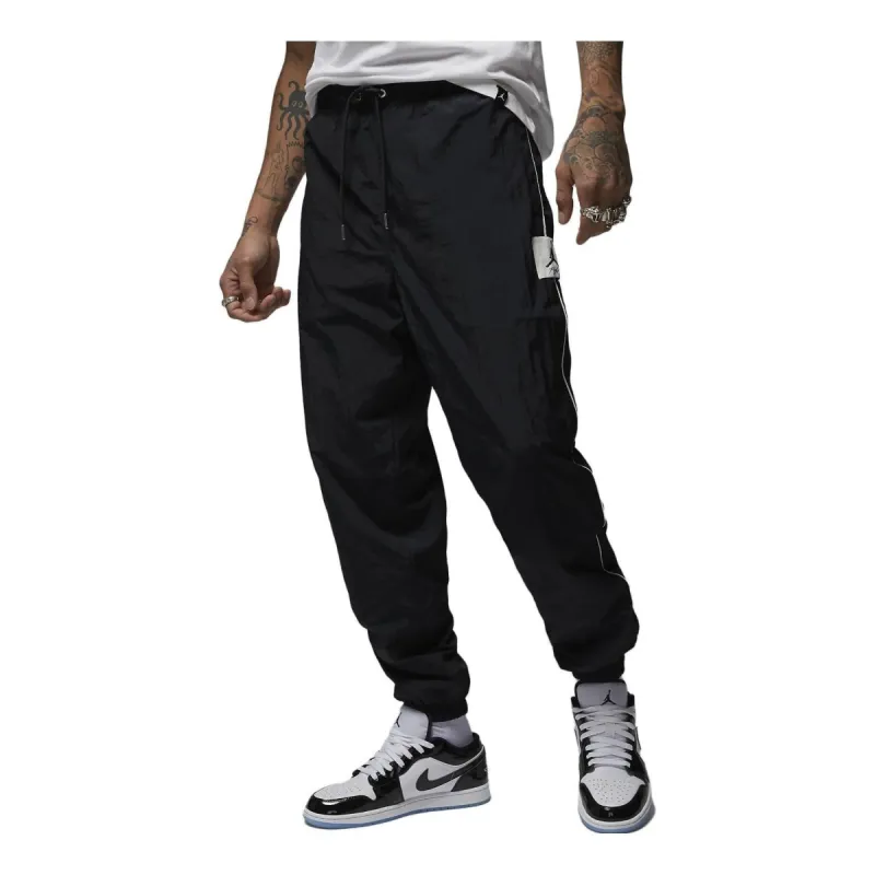 Air Jordan Essential Woven Flight Warm-up Pants 'Black' DV7622-010 sold by KicksCrew