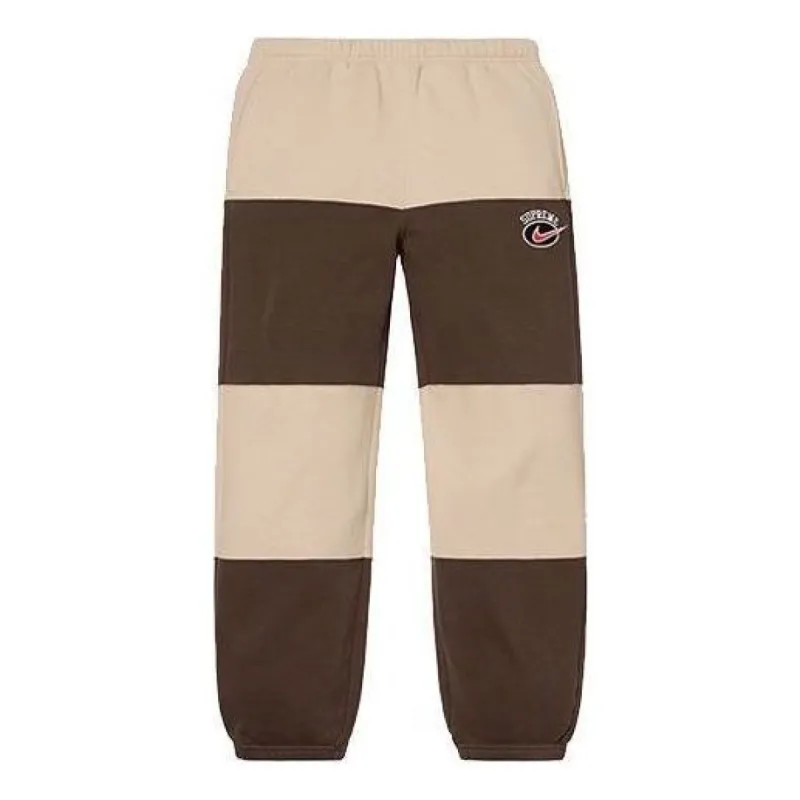 Supreme x Nike Stripe Sweatpants 'Brown Tan' SUP-SS19-10151 sold by KicksCrew