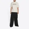 Balenciaga Retail Therapy Medium Fit T-Shirt 'Ivory Black' 612966TLVB19054 sold by KicksCrew