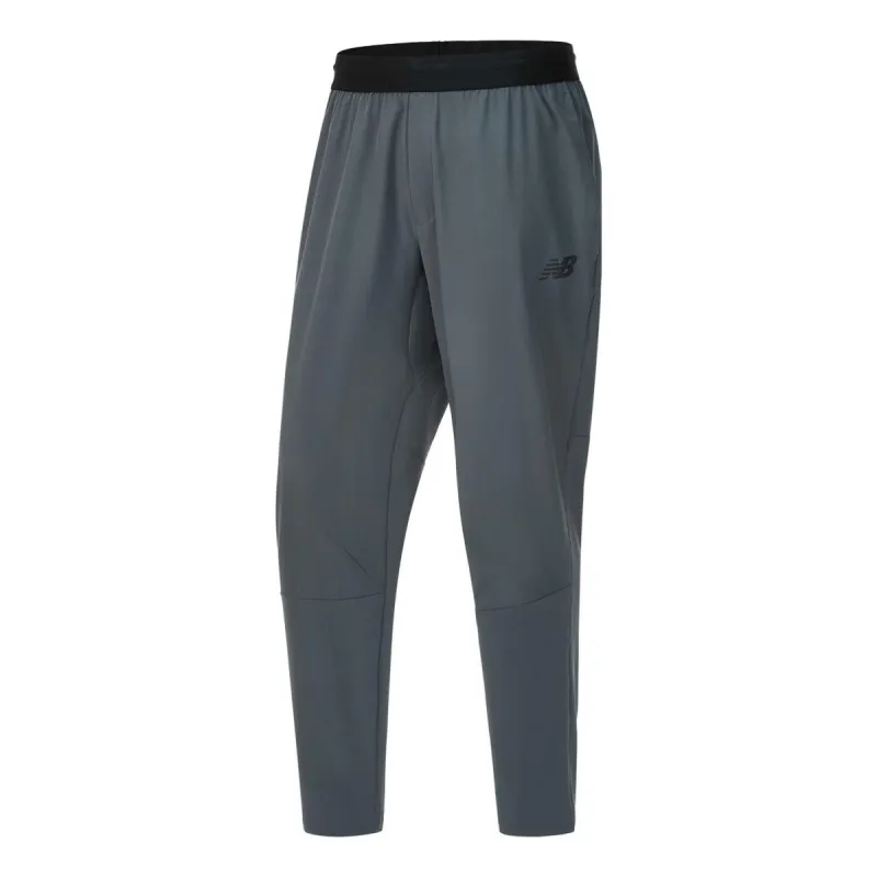 New Balance RWTech Stretch Woven Pants 'Lead' AMP31061-LED sold by KicksCrew
