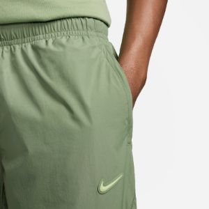 Nike x NOCTA Woven Track Pants 'Green' FN7668-386 sold by KicksCrew
