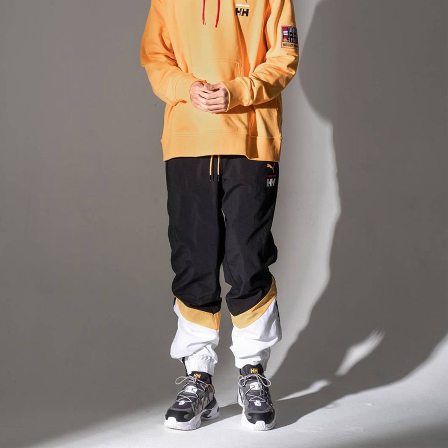 Puma x Helly Hansen Tailored For Sport Mens Track Pants 'Black White Yellow' 597145-89 sold by KicksCrew product image thumbnail 3