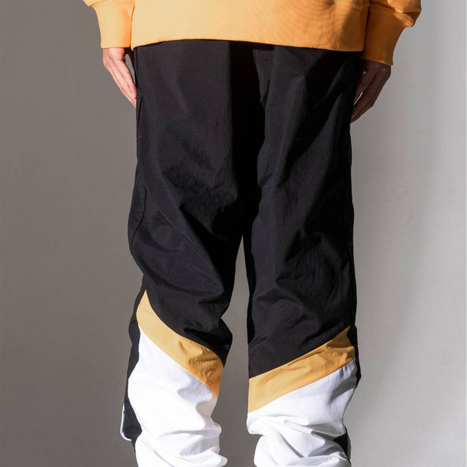 Puma x Helly Hansen Tailored For Sport Mens Track Pants 'Black White Yellow' 597145-89 sold by KicksCrew product image thumbnail 5