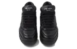 (WMNS) PRADA Padded Nappa Leather Sneakers 'Black' 1E136N_2DL8_F0002_F_B030 sold by KicksCrew