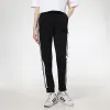 (WMNS) adidas Woven Pants 'Black White' GT4408 sold by KicksCrew