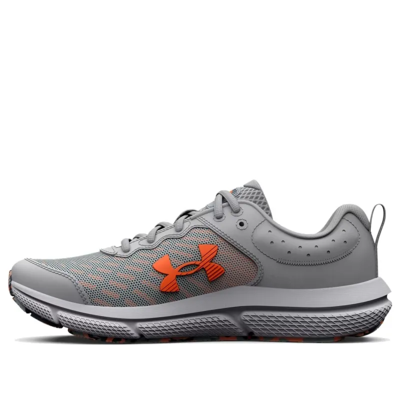 (GS) Under Armour Assert 10 AC 'Mod Grey Orange Blast' 3026182-103 sold by KicksCrew
