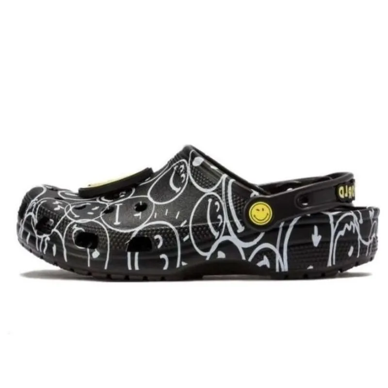(WMNS) Crocs Smiley World Classic Clogs 'Black White Yellow' 873137 sold by KicksCrew