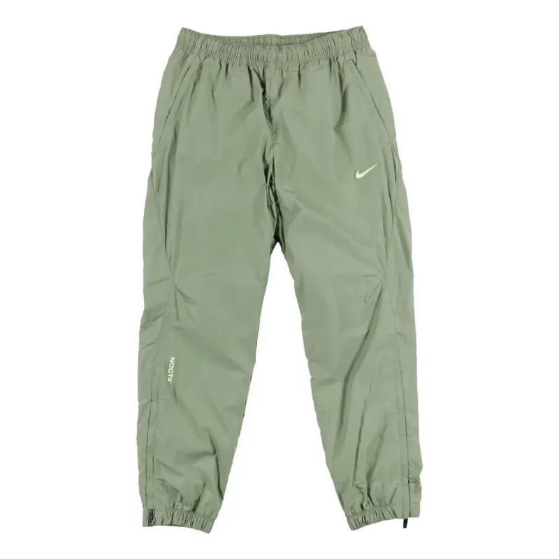 Nike x NOCTA Woven Track Pants 'Green' FN7668-386 sold by KicksCrew