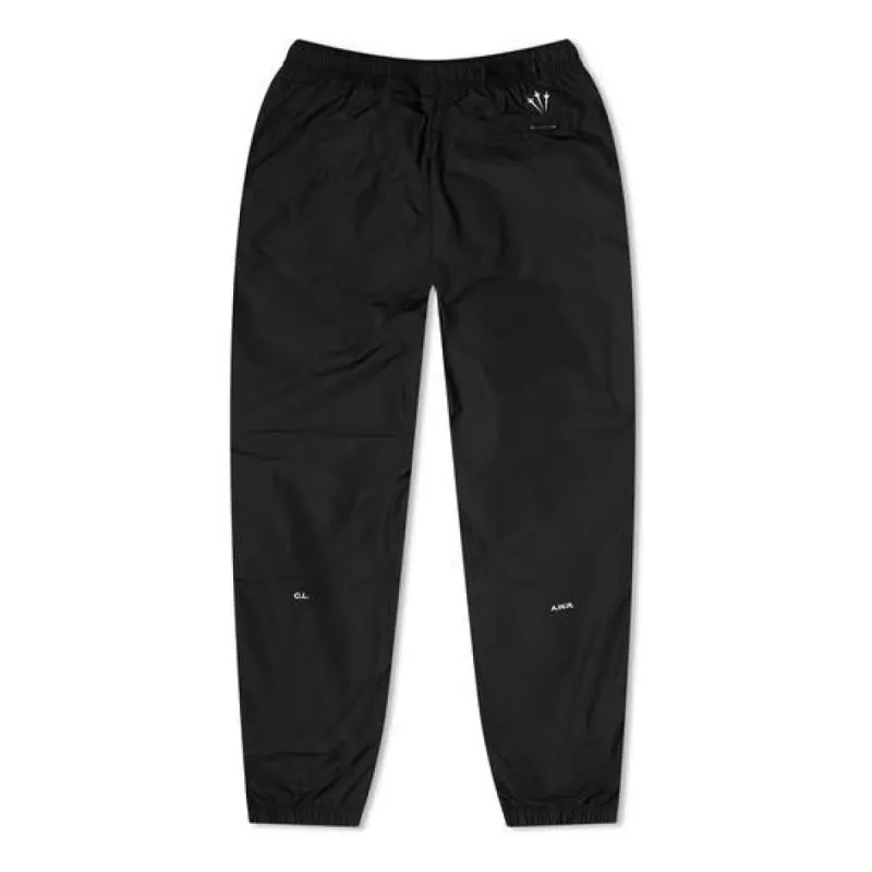 Nike x NOCTA Woven Track Pants 'Black' FN7668-010 sold by KicksCrew
