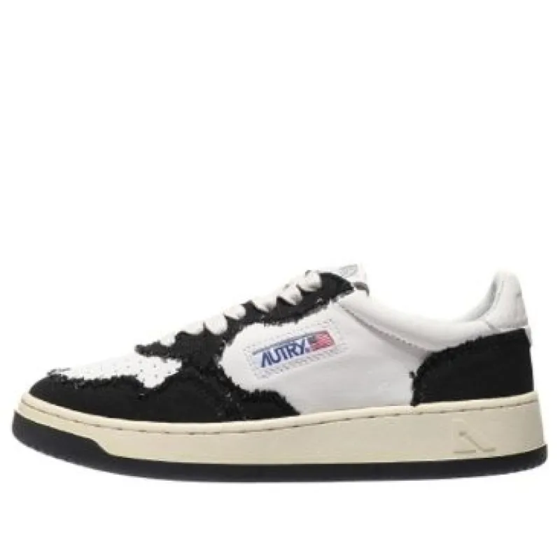 (WMNS) AUTRY Medalist Low Goatskin 'White Black' AULM-CB02 sold by KicksCrew