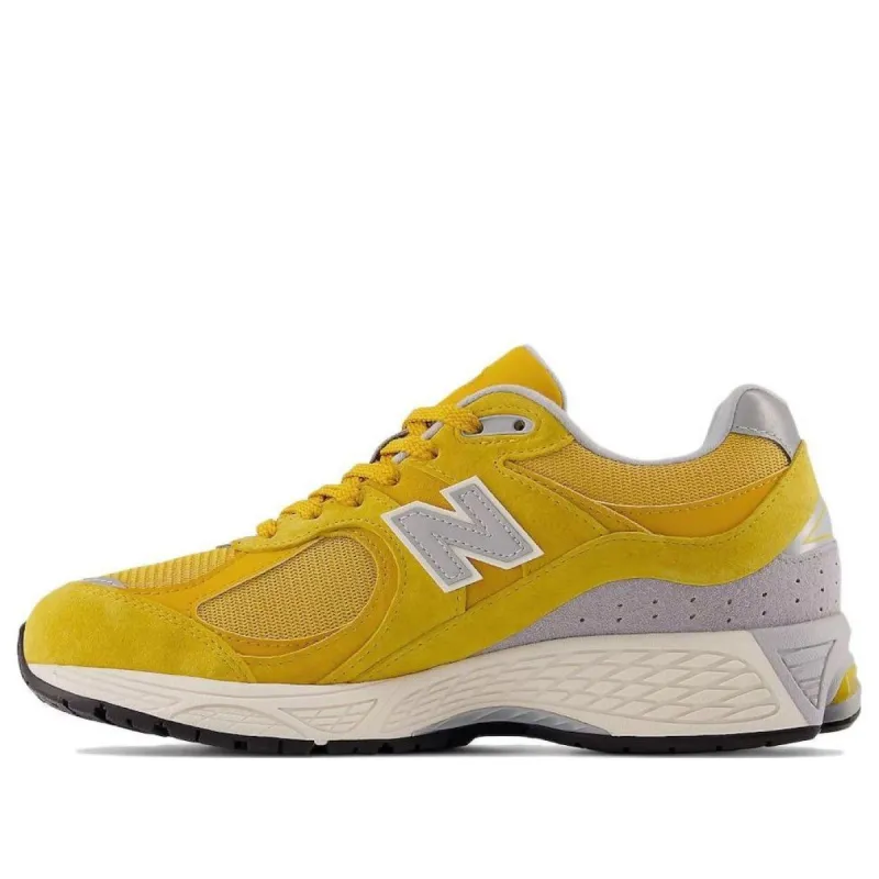 New Balance 2002R 'Egg yolk' M2002RHT sold by KicksCrew