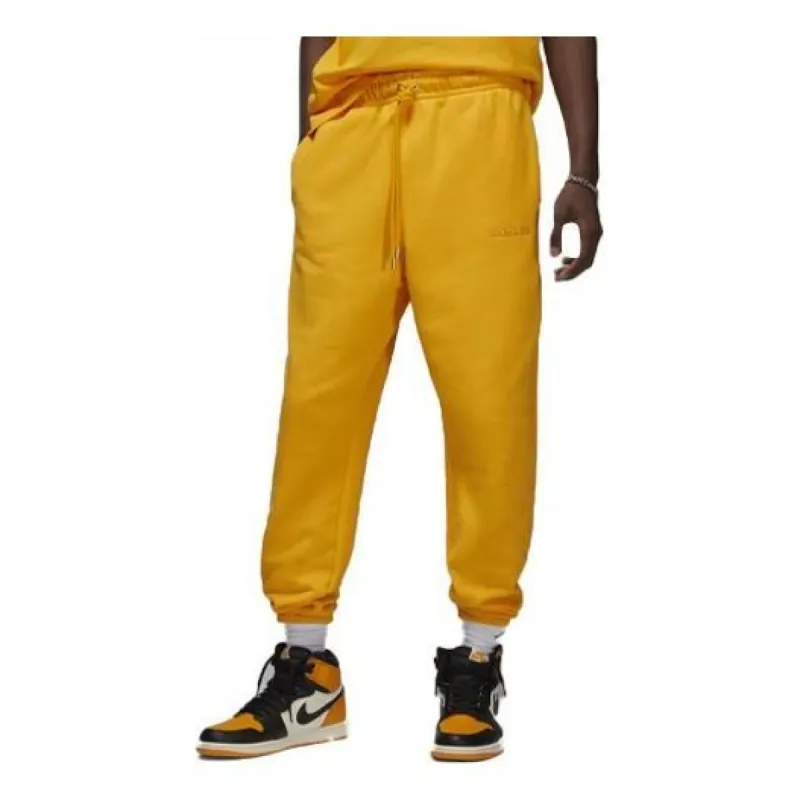 Air Jordan x Wordmark Fleece Joggers 'Yellow' FJ0697-739 sold by KicksCrew