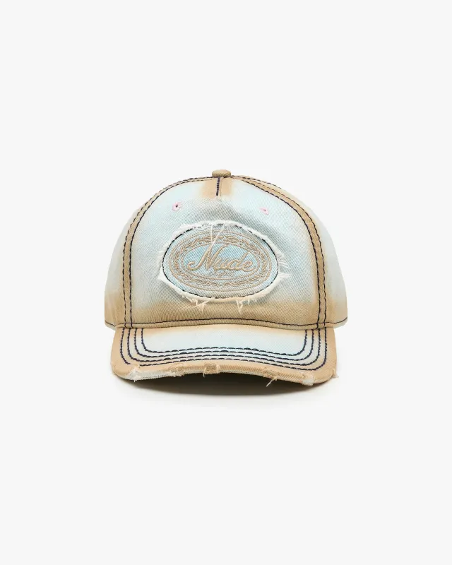 Laurel Denim Cap White sold by Nude Project