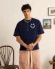 Happy Tee Navy sold by Nude Project