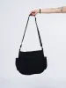 Super Star Black Canvas Messenger Bag sold by Minga London