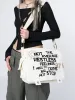 Non Stop White Canvas Messenger Bag sold by Minga London
