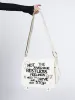Non Stop White Canvas Messenger Bag sold by Minga London