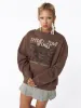 Spread Your Wings Brown Sweatshirt sold by Minga London